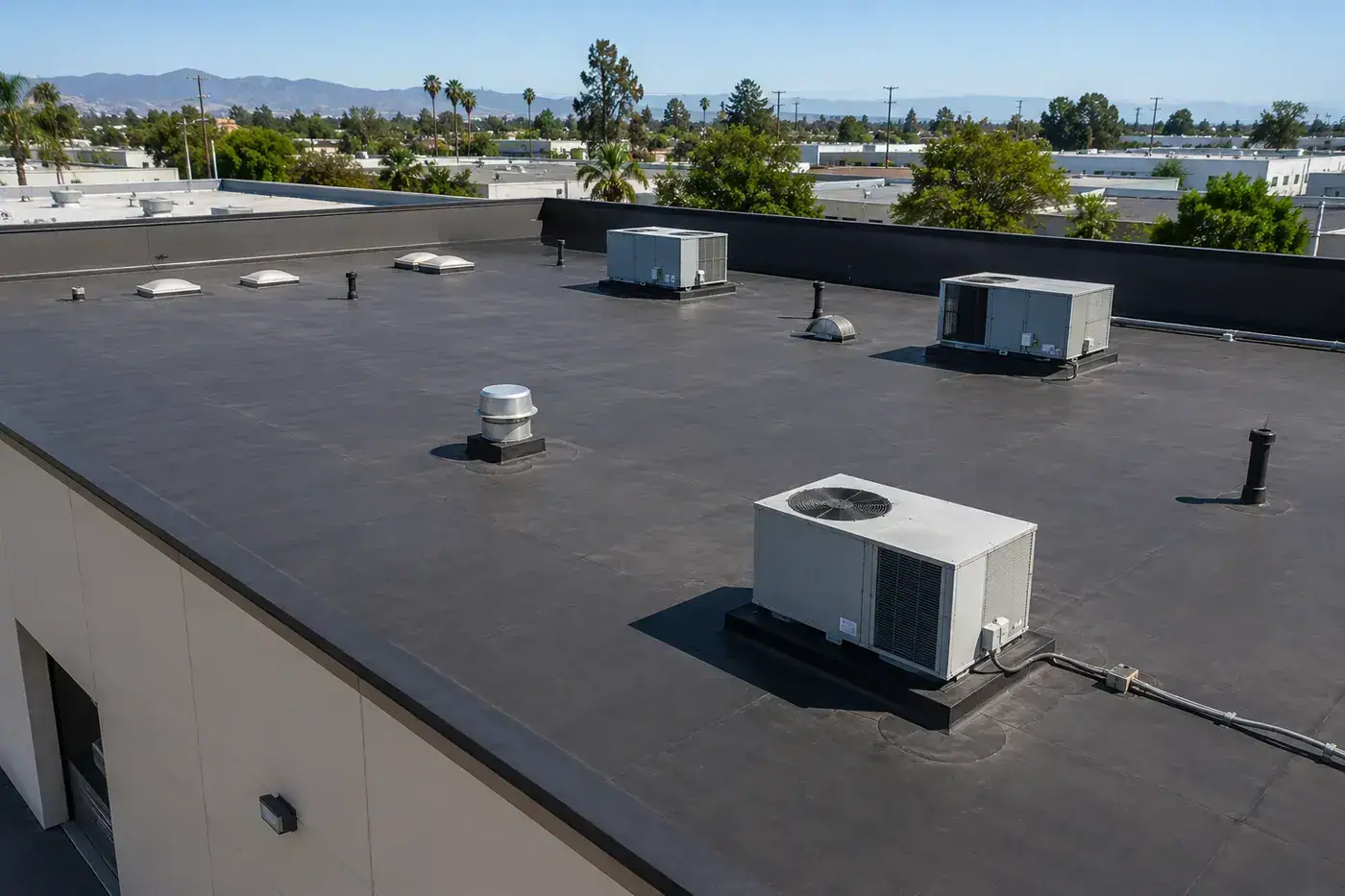 Low-slope flat roof section on a residential structure